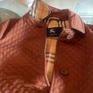 Burberry brown quilted barn jacket no tags but no signs of wear. Great condition